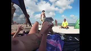 Exhibitionist Wife 511 - Mrs Nuzzle gives us her NUDE BEACH POV view of a VOYEUR JERKING OFF close to front of her and several other men watching!